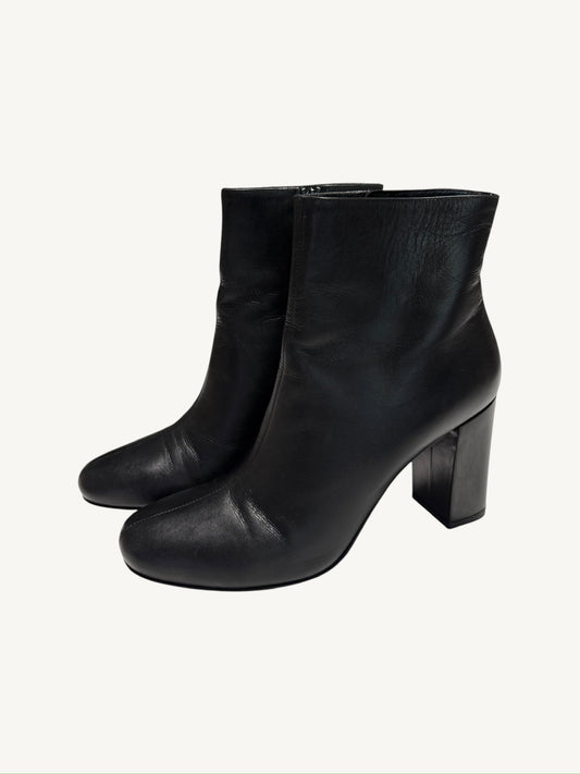 Saint Laurent Lou 95 black calfskin ankle boots, pair shown from the opposite three-quarter angle