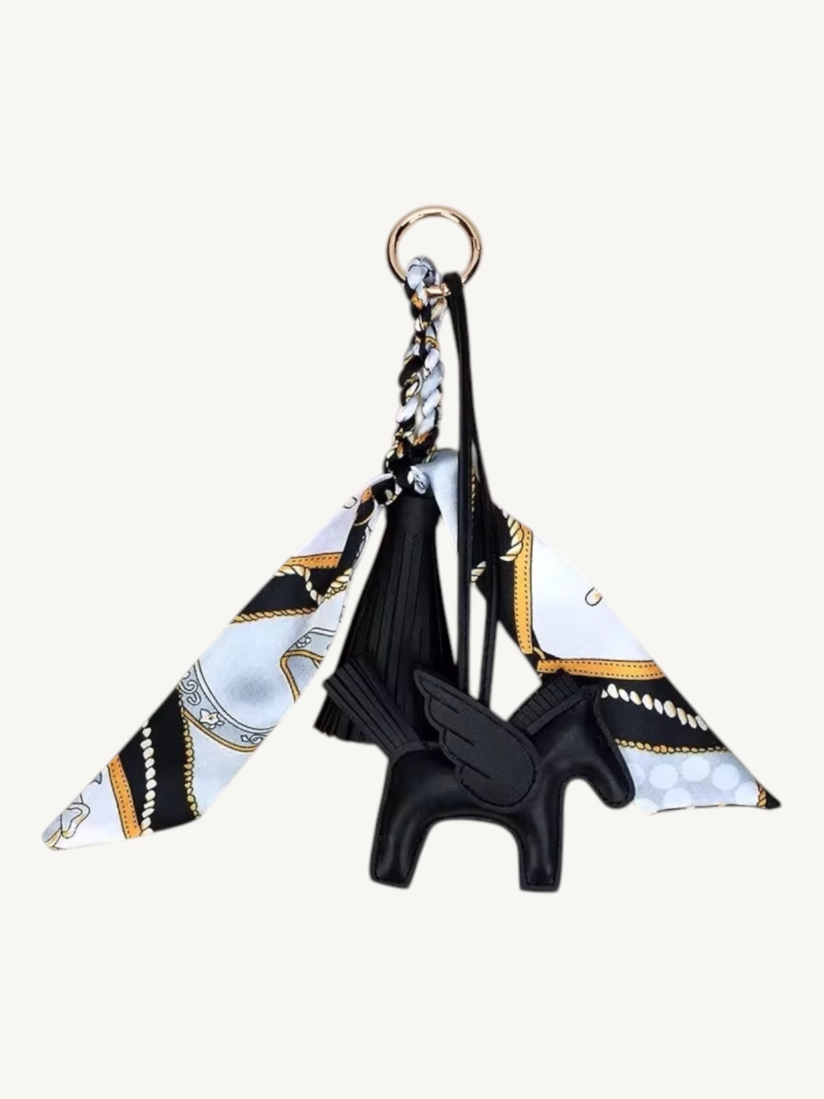 Black Pegasus horse bag charm with black wing and tassel, black and white equestrian chain-print satin ribbon scarf with gold accents — Shimmer & Shawls

