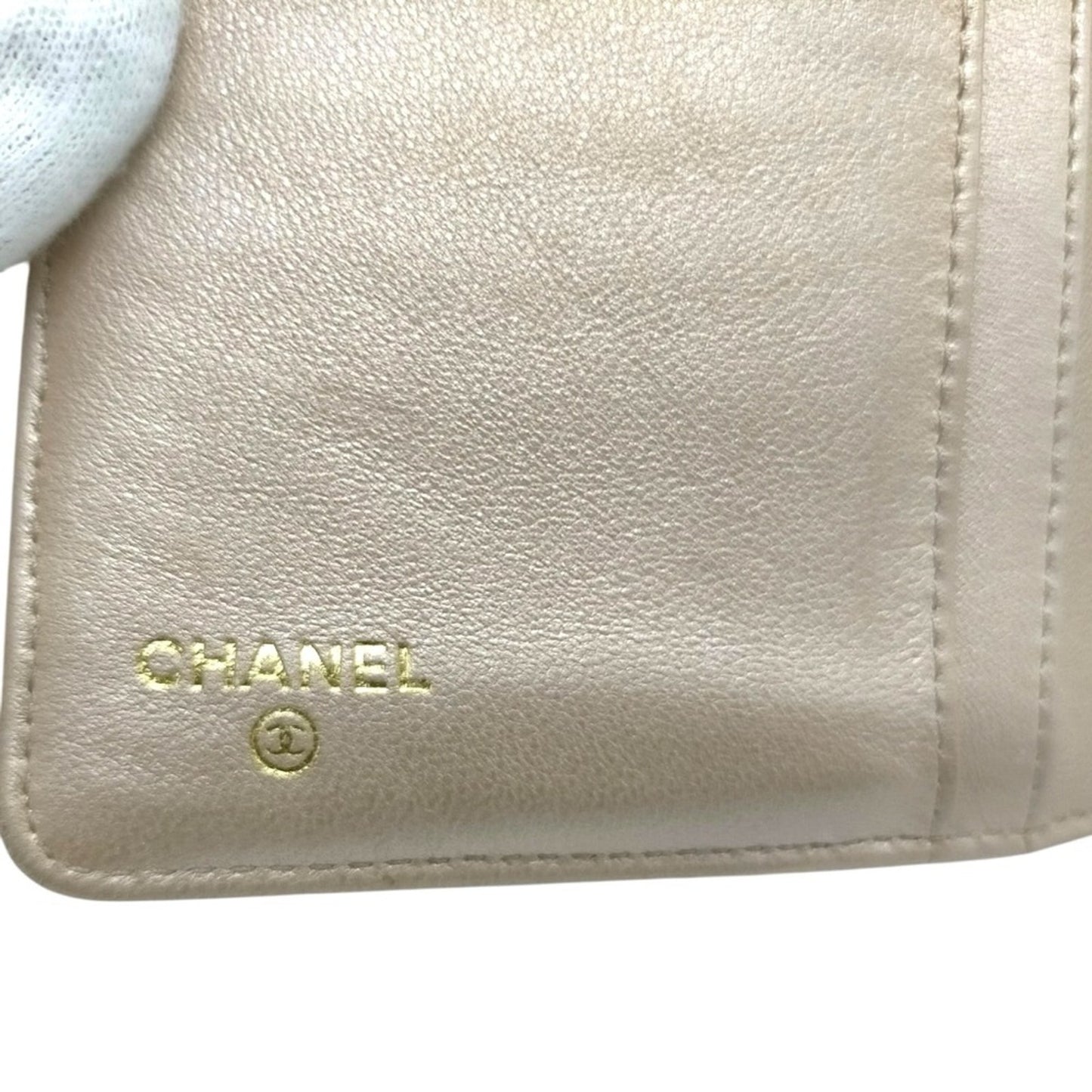 CHANEL Pink Camellia Embossed Long Bifold Leather Wallet