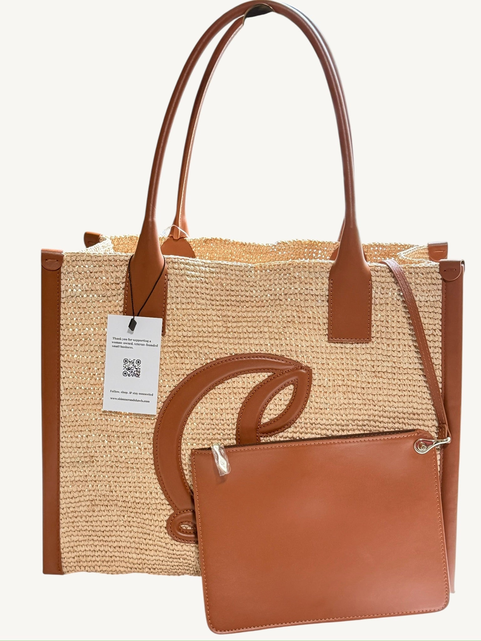 Christian Louboutin By My Side Large Tote side view showing structured raffia body and leather handles