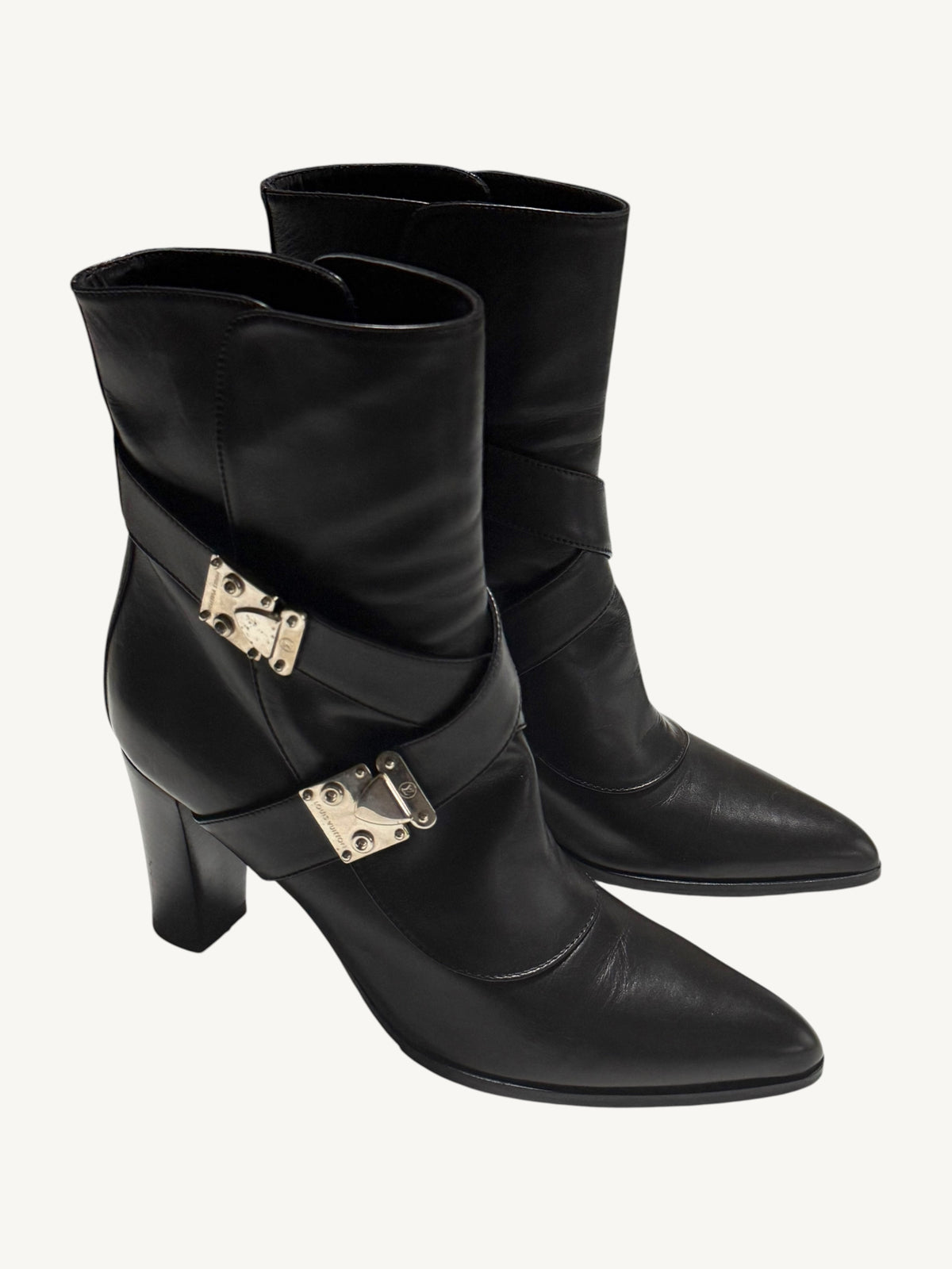 Black Louis Vuitton ankle boots angled right, showing silver-tone S-Lock hardware and block heels.