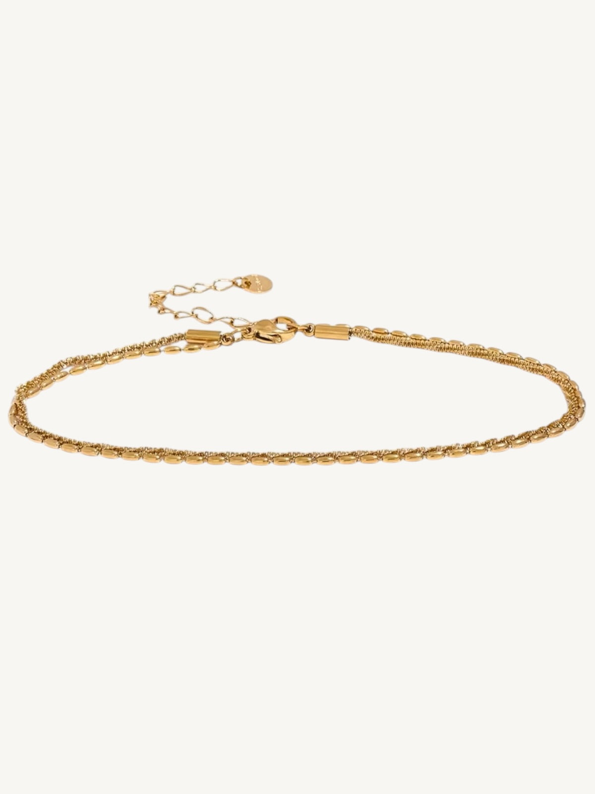 The Côte gold double-strand chain anklet flat lay — Shimmer & Shawls