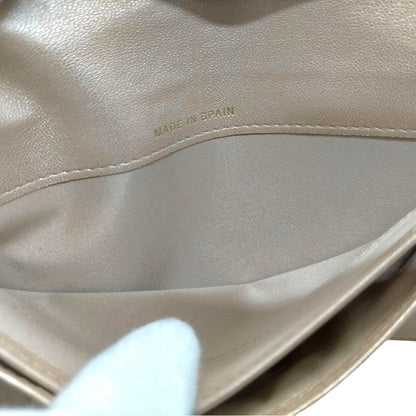 CHANEL Pink Camellia Embossed Long Bifold Leather Wallet