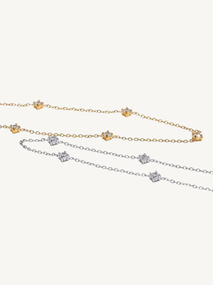 The Étoile gold and silver CZ station anklets side by side — Shimmer & Shawls