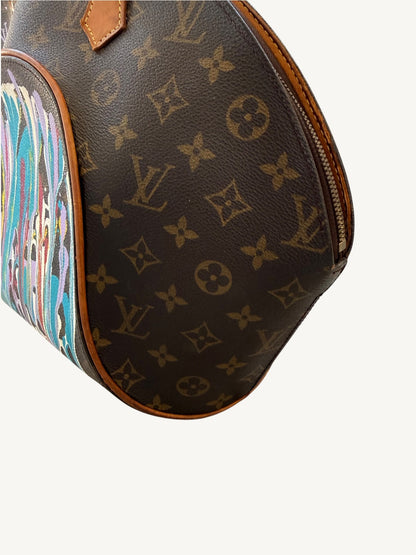 Close-up of custom hand-painted drip art on Louis Vuitton Ellipse MM Monogram canvas