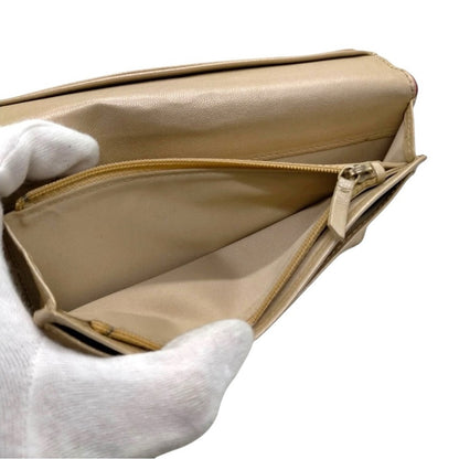 CHANEL Pink Camellia Embossed Long Bifold Leather Wallet