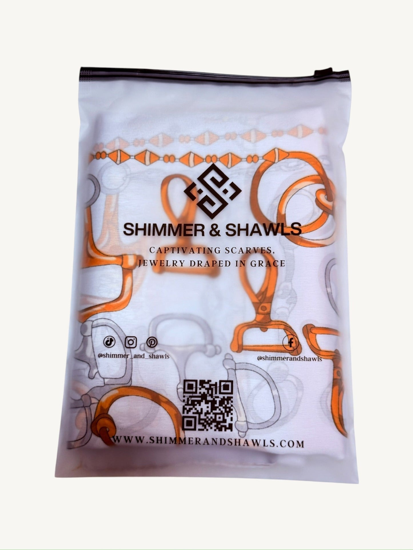 The Deauville scarf in Shimmer & Shawls branded zipper bag packaging