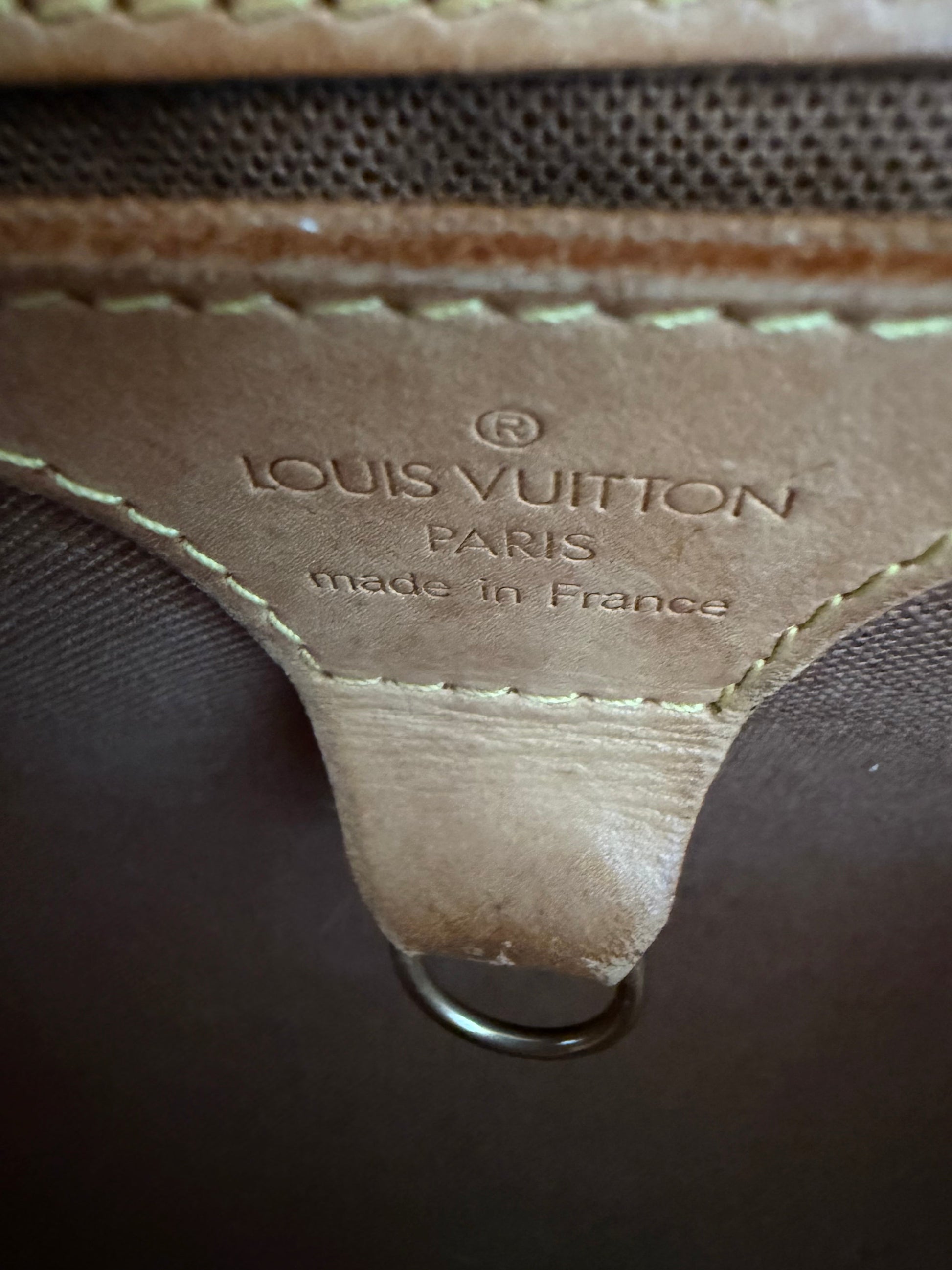 Louis Vuitton Ellipse MM top handles and zipper detail with aged gold-tone hardware