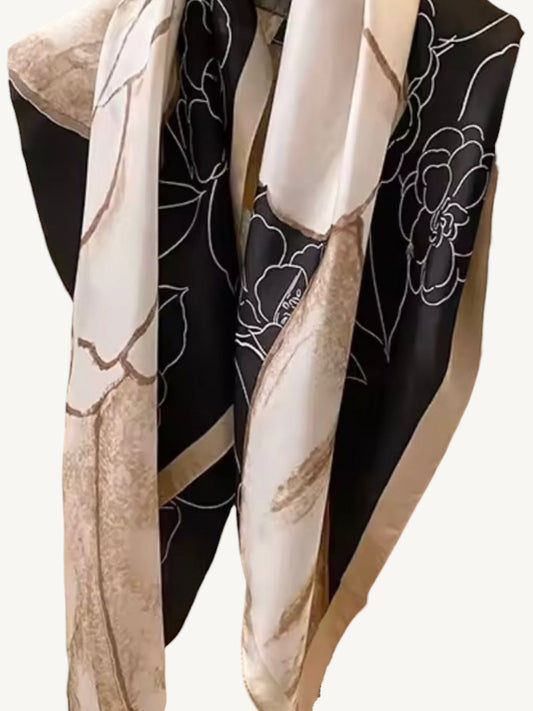 The Vendôme – camellia floral square silky satin scarf draped showing black and cream panels by Shimmer & Shawls