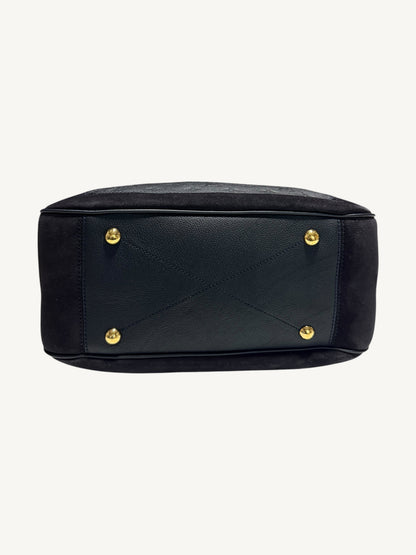 Photo 6 — Louis Vuitton Audacieuse MM Infini — bottom view showing four gold-tone protective feet and base leather panel