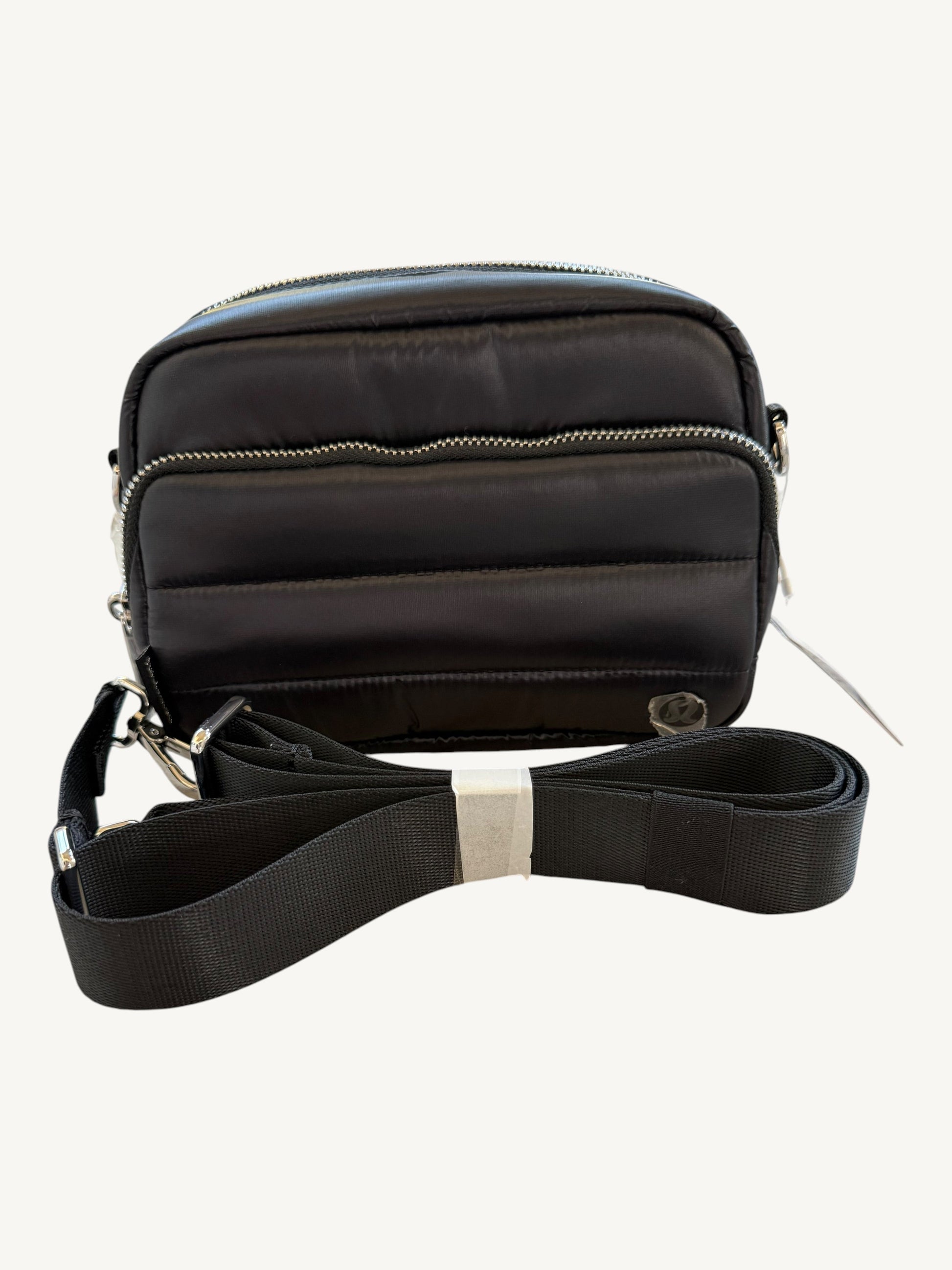 Lululemon Everywhere Crossbody 2L Wunder Puff Black — female model lifestyle shot | Shimmer & Shawls