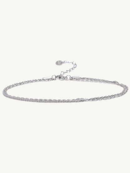 The Côte silver double-strand chain anklet flat lay — Shimmer & Shawls
