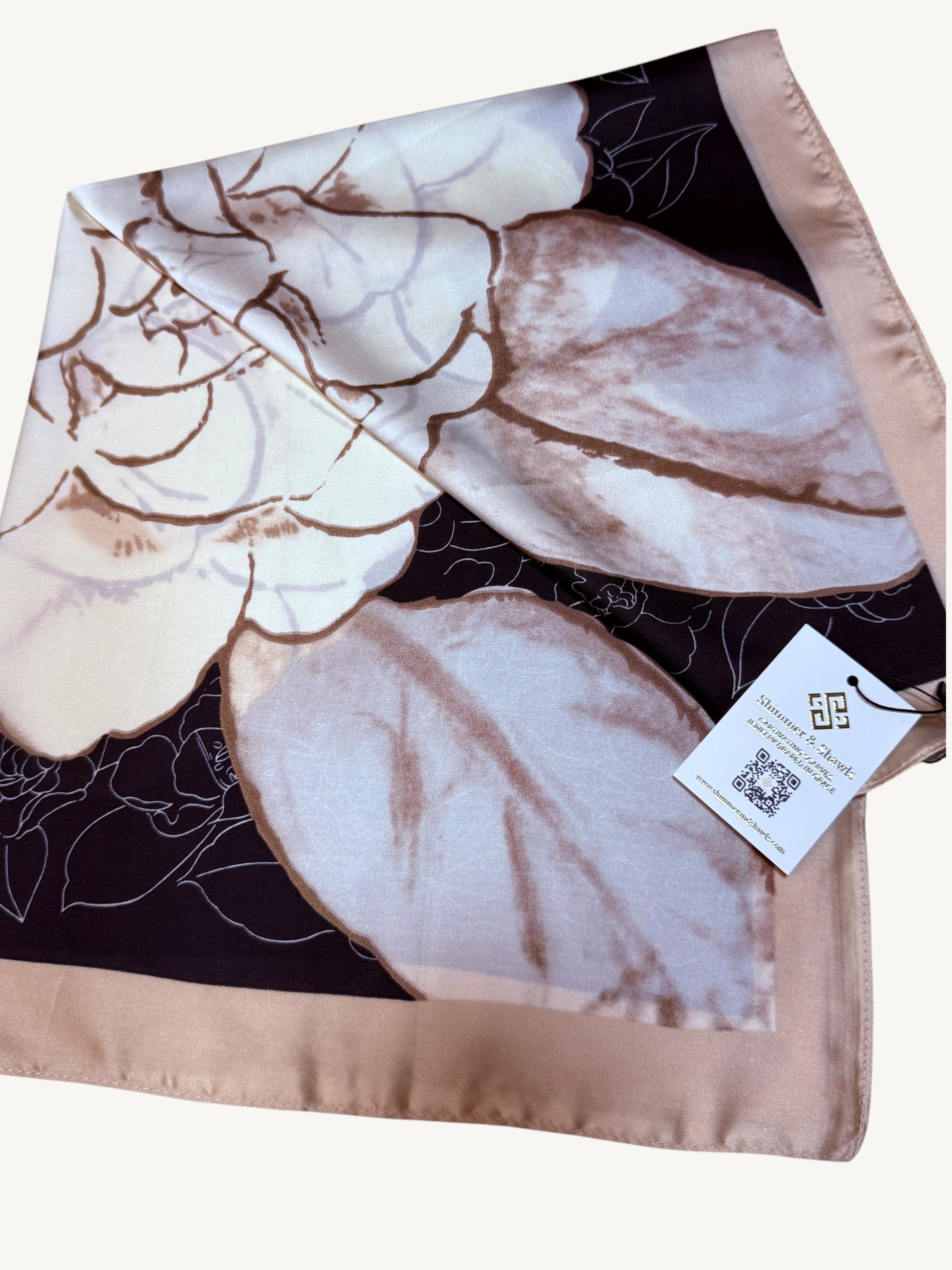 The Vendôme – camellia floral square scarf flat lay with Shimmer & Shawls hang tag