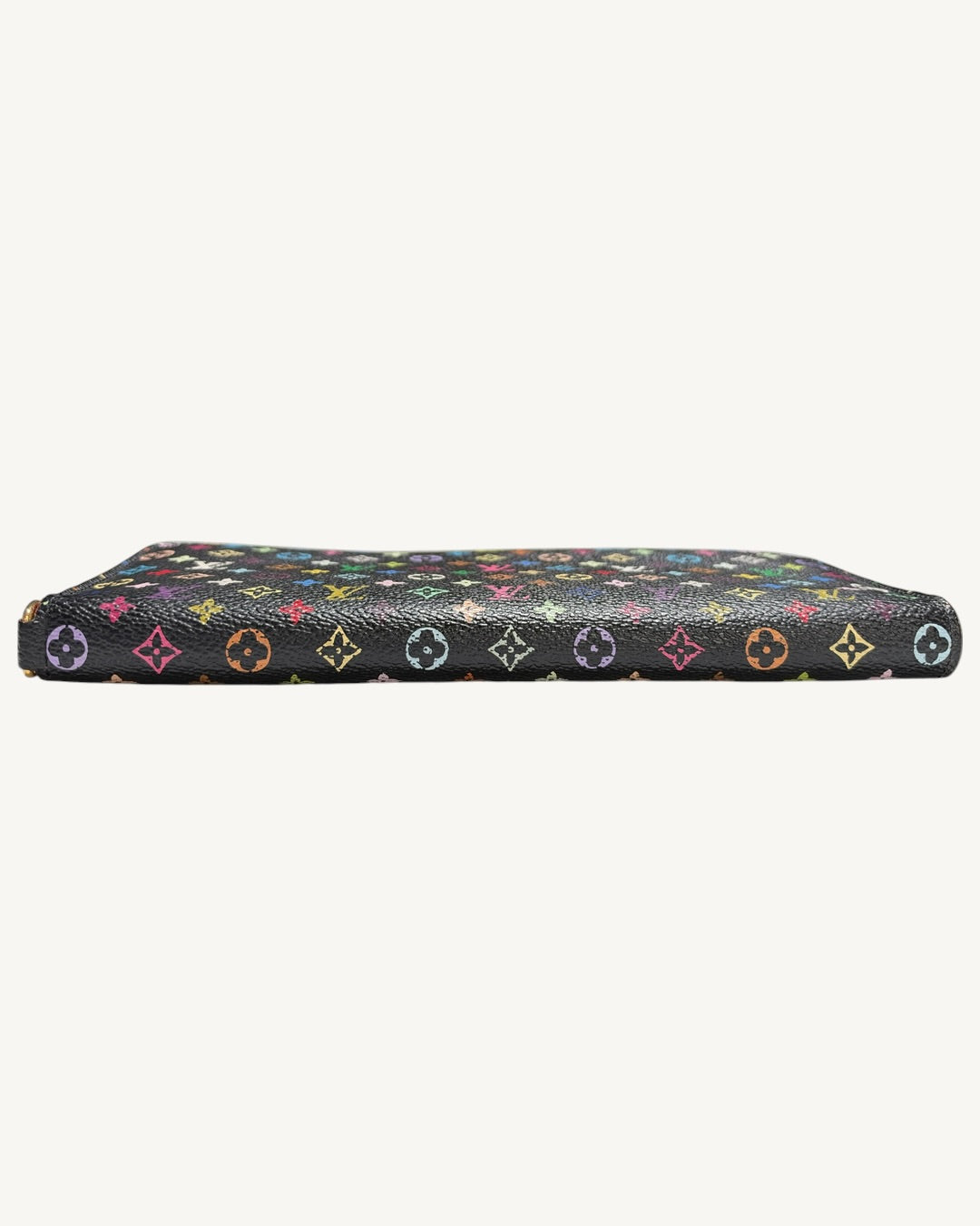 Close-up side profile of the folded black Monogram Multicolore canvas edge on the Louis Vuitton Insolite wallet.