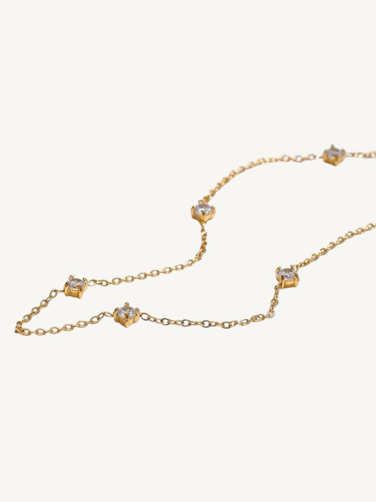 The Étoile gold CZ station anklet detail shot — Shimmer & Shawls