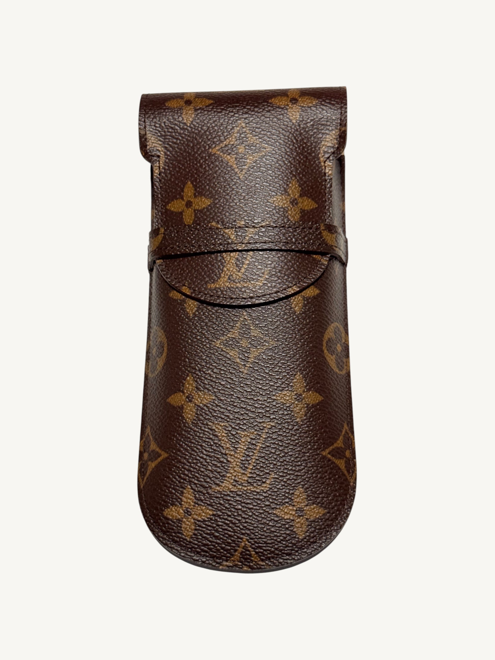 Louis Vuitton Monogram Étui Stylo Pen Case M62990 — front view showing monogram canvas and fold-over flap with leather loop closure | Shimmer & Shawls
