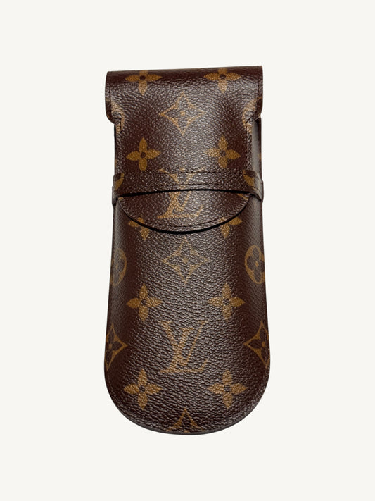 Louis Vuitton Monogram Étui Stylo Pen Case M62990 — front view showing monogram canvas and fold-over flap with leather loop closure | Shimmer & Shawls