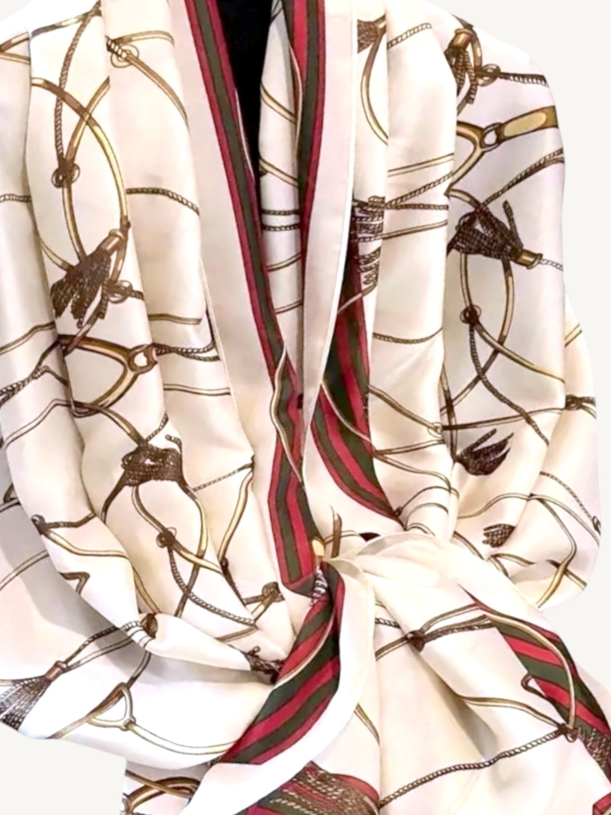 The Matera – ivory silky satin scarf shawl wrap showing full equestrian print with red and green striped border, draped on white background