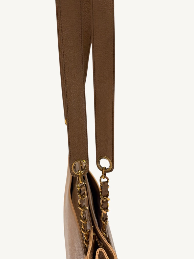 Dual beige leather shoulder straps and leather-threaded chain sections