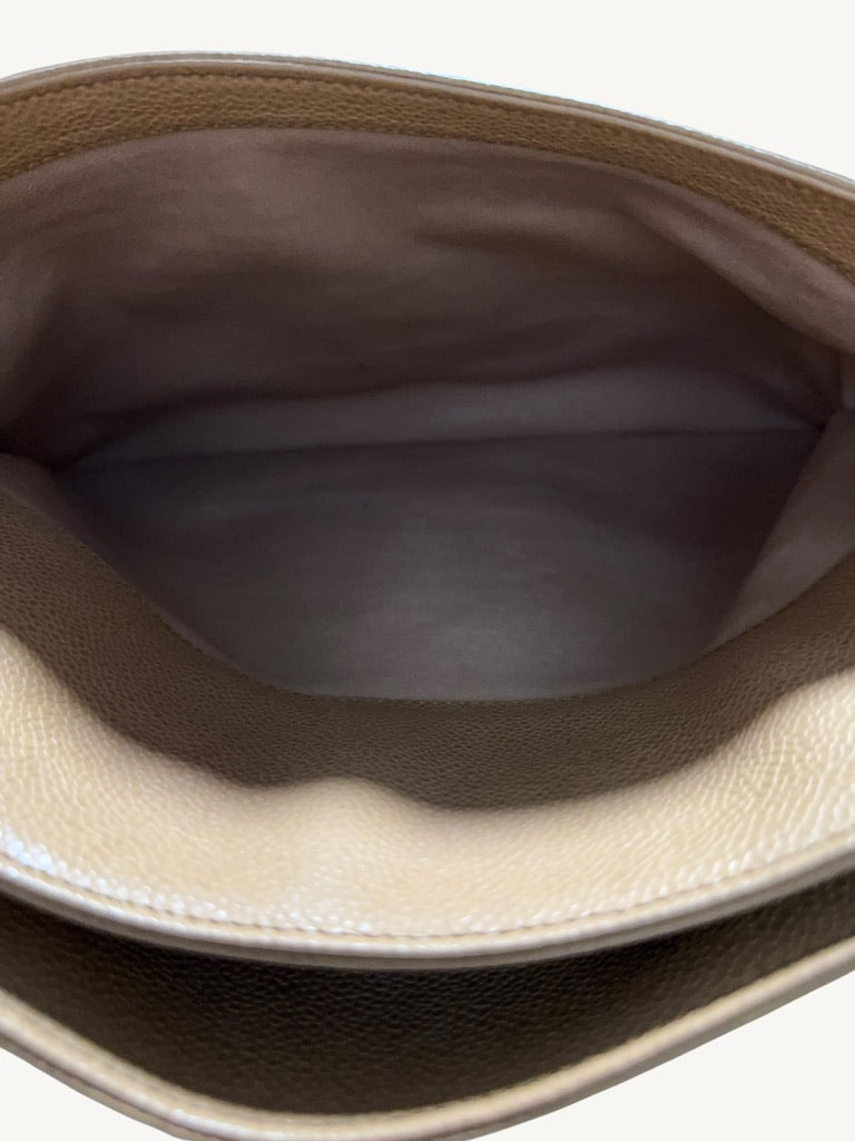Interior leather base and walls of vintage Chanel shopping tote