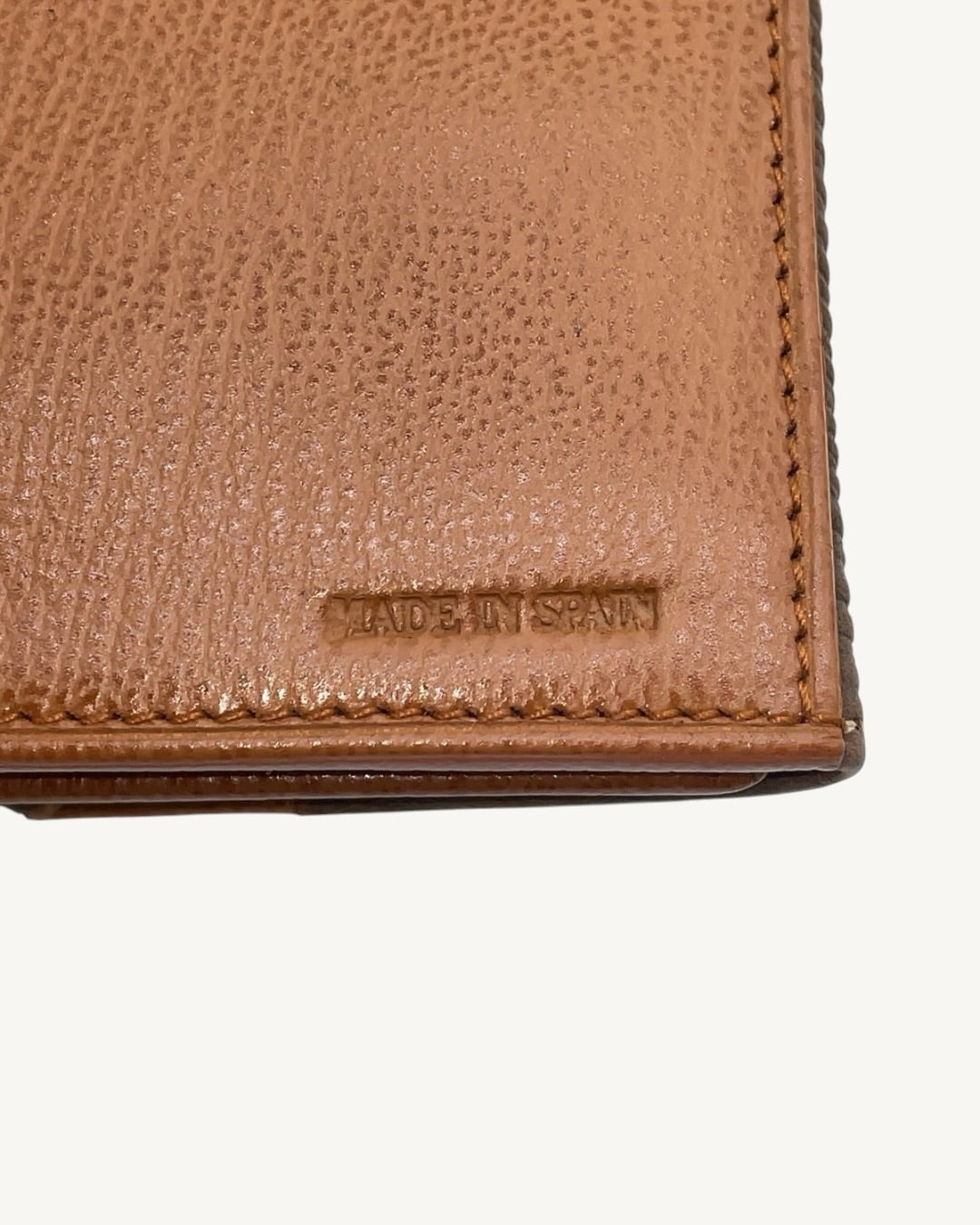 Made in Spain stamp and corner stitching