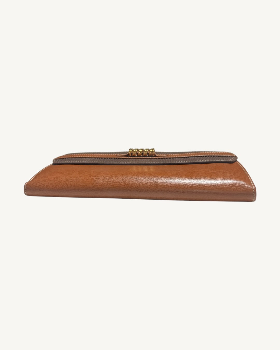 Tan leather bottom fold profile