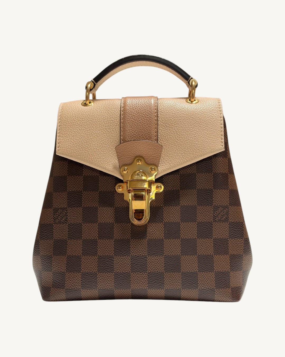 Louis Vuitton Clapton Backpack — Front view with ivory crème and warm taupe leather flap and gold-tone clasp