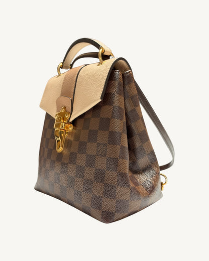 Louis Vuitton Clapton Backpack — Three-quarter front view showing Damier Ebene canvas and side gusset