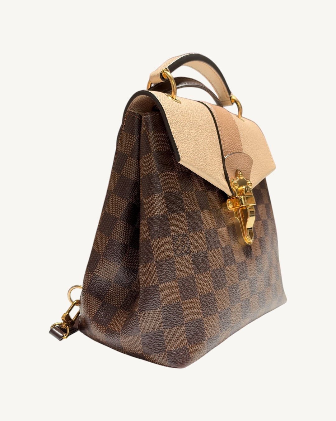 Louis Vuitton Clapton Backpack — Opposite three-quarter front view with leather top handle