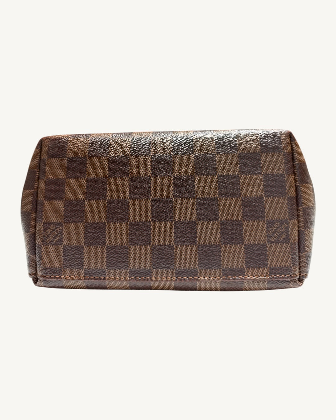 Louis Vuitton Clapton Backpack — Bottom view showing Damier Ebene canvas base and stitched edges