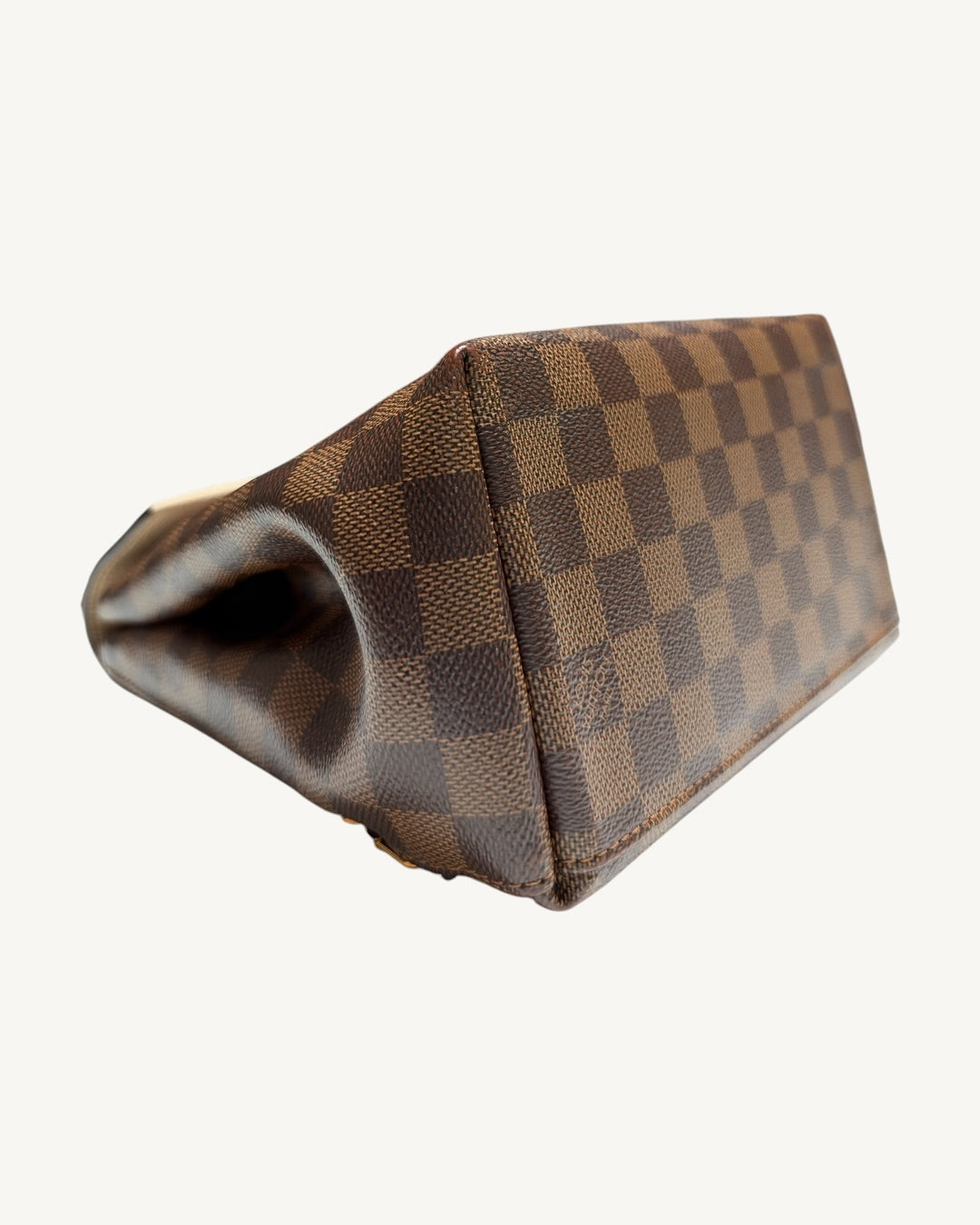 Louis Vuitton Clapton Backpack — Angled bottom view showing opposite corner and canvas pattern