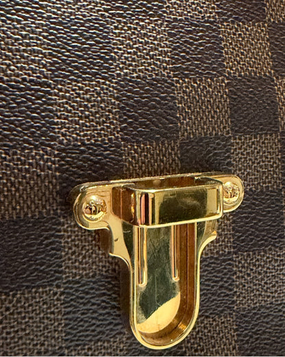 Louis Vuitton Clapton Backpack — Gold-tone lower clasp detail against Damier Ebene canvas