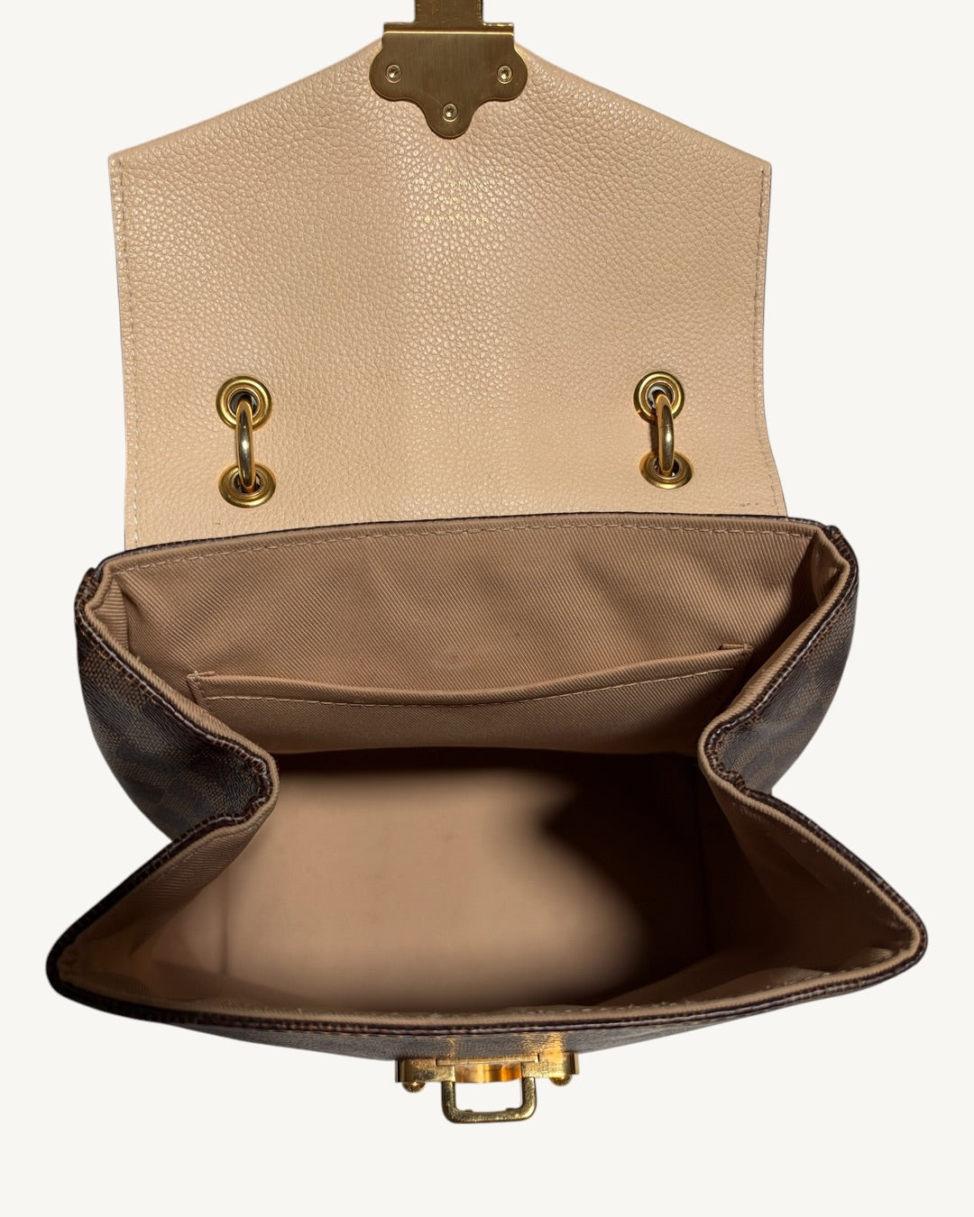 Louis Vuitton Clapton Backpack — Open main compartment showing textile lining and interior flat pocket