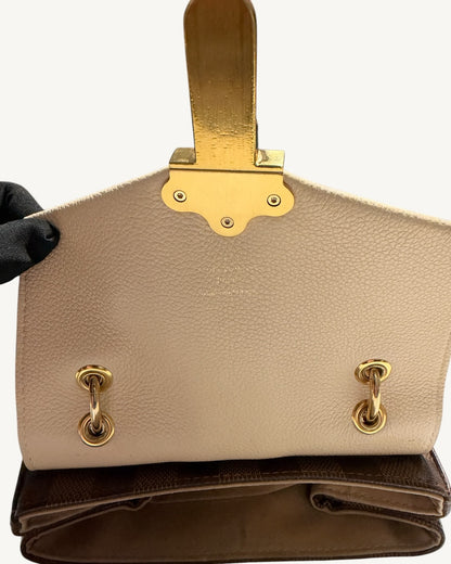 Louis Vuitton Clapton Backpack — Inside leather flap with closure backing, handle rings and brand stamp