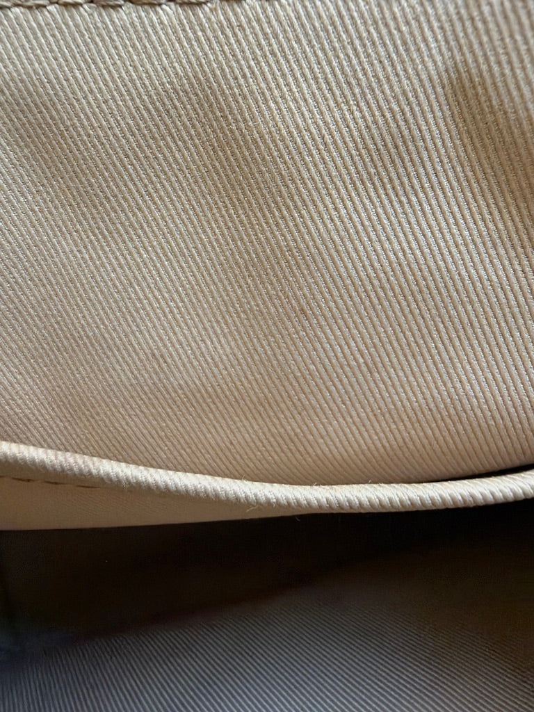 Louis Vuitton Clapton Backpack — Close-up of textile flat pocket lining and bound pocket edge