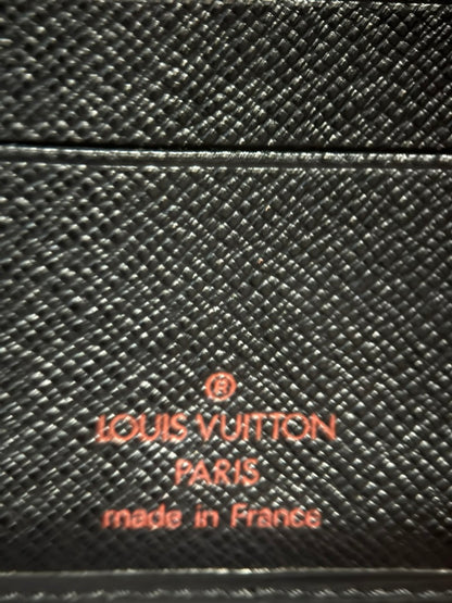 Louis Vuitton Paris made in France stamp on black cross-grain leather interior