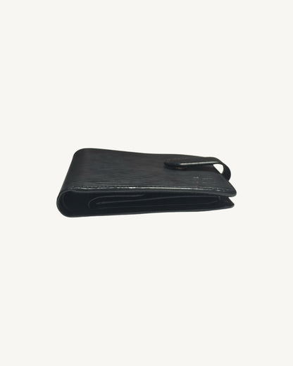 Edge profile of Louis Vuitton black Epi wallet showing layered leather compartments