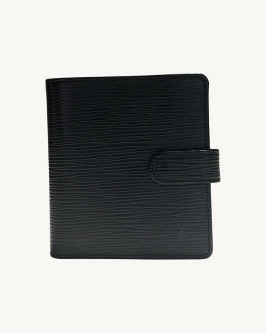 Front of Louis Vuitton black Epi leather compact bifold wallet with leather snap tab and embossed LV logo