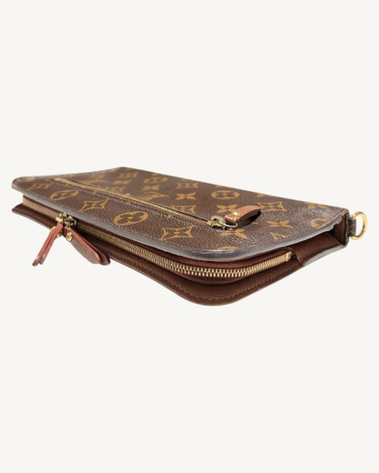 Opposite angled side view of Monogram wallet with exterior pocket zipper and D-ring at right