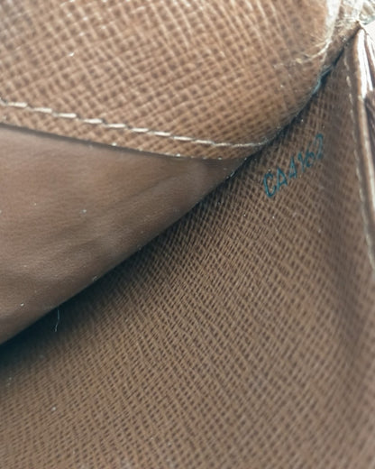 Close-up of CA4162 date code inside brown Louis Vuitton wallet pocket
