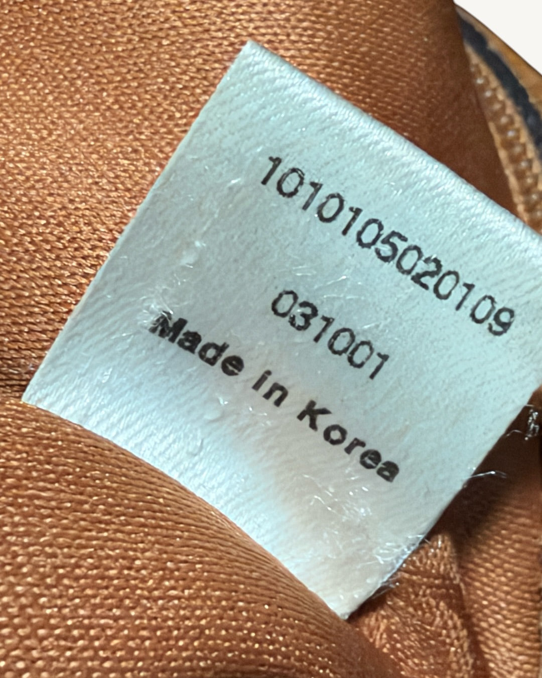 Interior identification label reading 1010105020109, 031001 and Made in Korea.