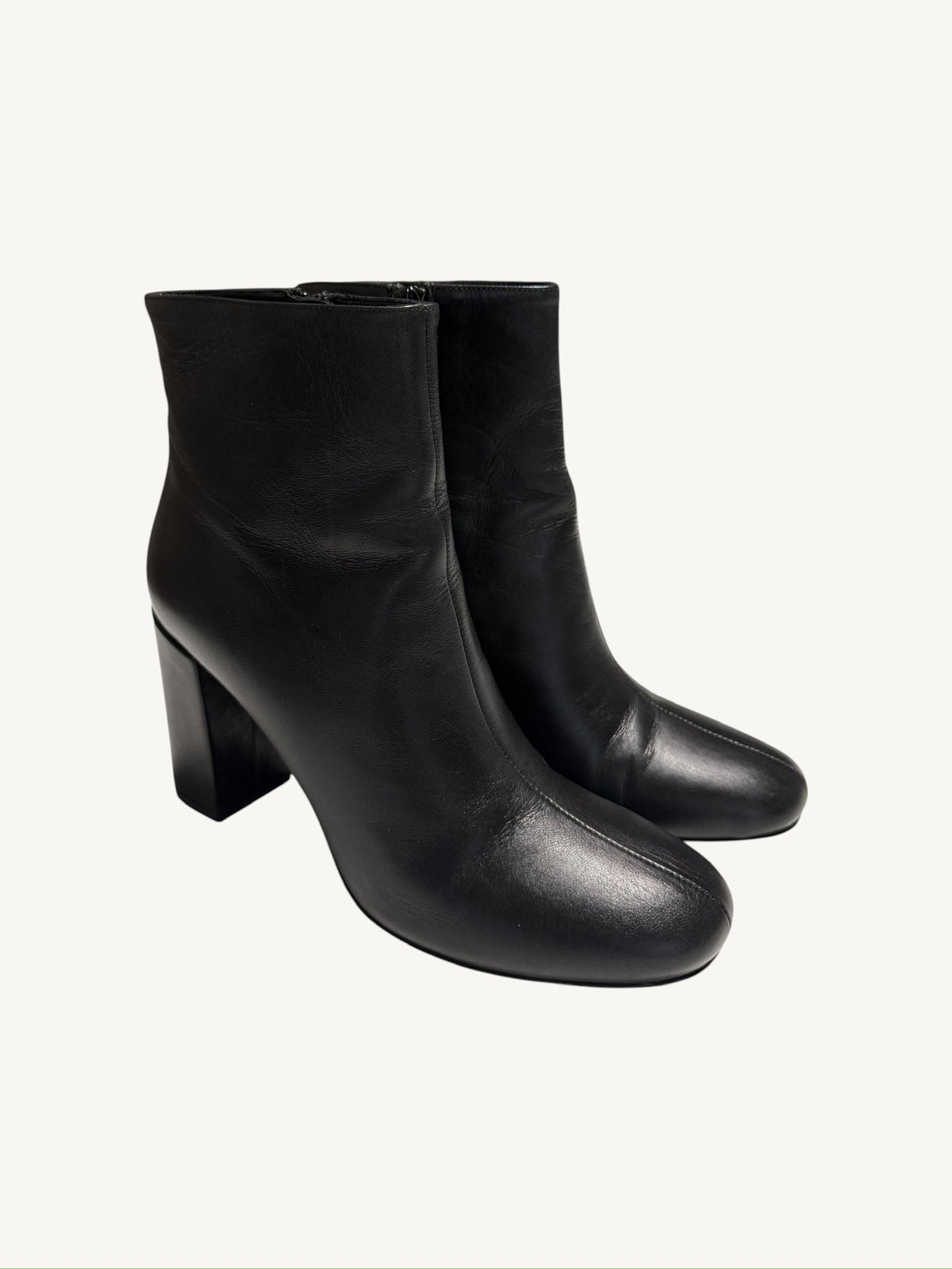 Saint Laurent Lou 95 black calfskin ankle boots, pair shown from a front three-quarter angle
