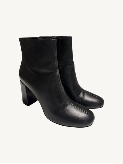 Saint Laurent Lou 95 black calfskin ankle boots, pair shown from a front three-quarter angle