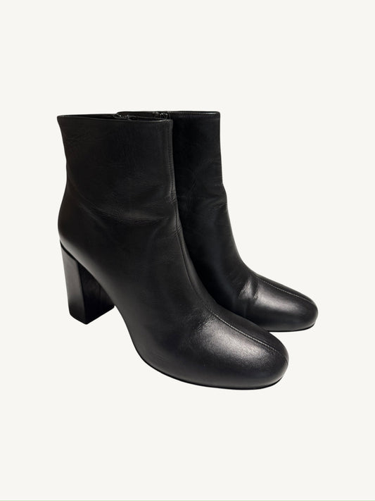 Saint Laurent Lou 95 black calfskin ankle boots, pair shown from a front three-quarter angle