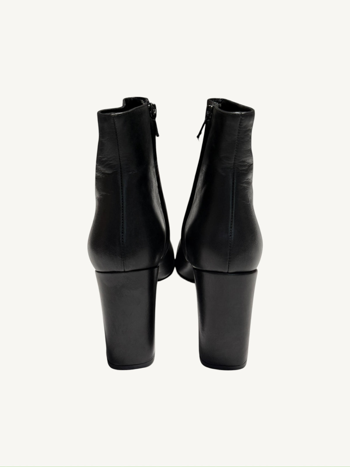 Rear view of Saint Laurent Lou 95 black calfskin ankle boots with block heels