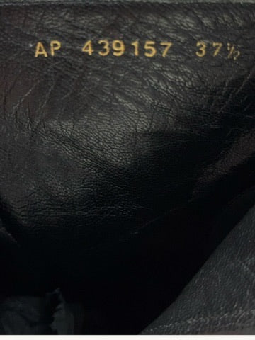 Interior stamp showing Saint Laurent ankle boot code AP 439157 and size 37.5