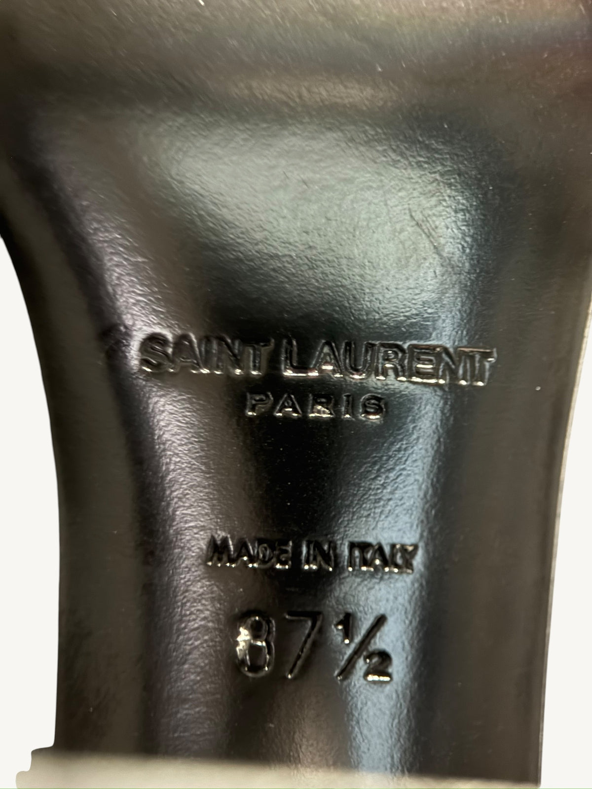 Close-up Saint Laurent Paris outsole branding with Made in Italy and size 37.5