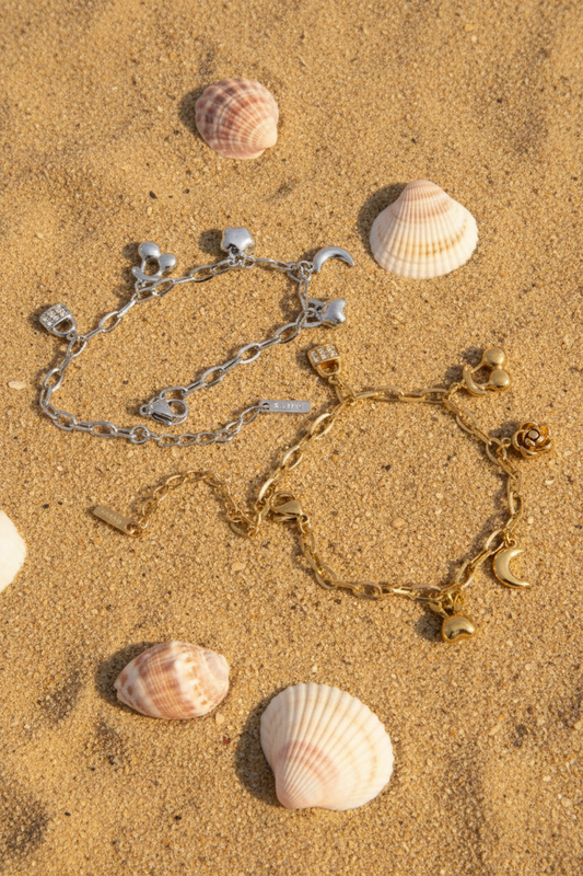 The Celeste — Gold & Platinum Beach Flat Lay